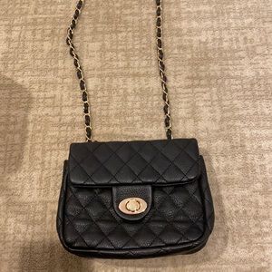 Black and gold cross body bag